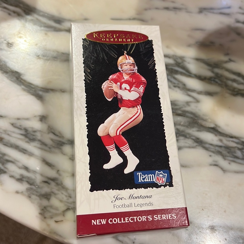 Hallmark Joe Montana. Football legends Christmas  ornament Nib. Never opened NFL